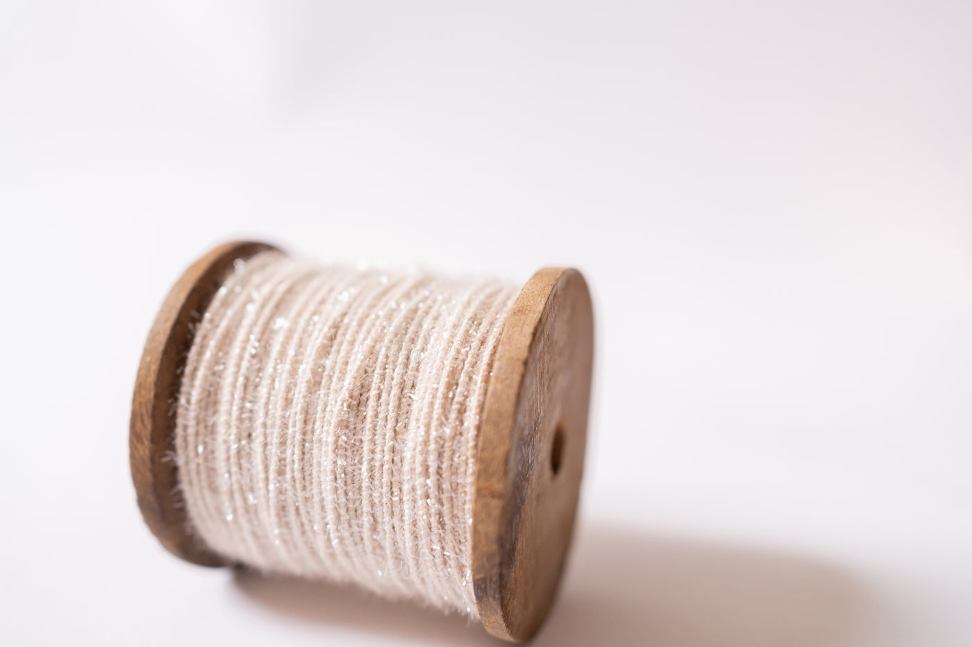 Iridescent Tinsel Cotton Cord on Wood Spool